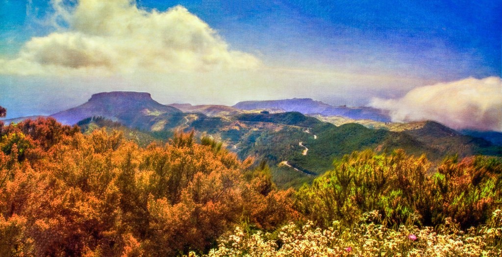 Magnificent wide mountain view representing an escaping quest for extraordinary experiences