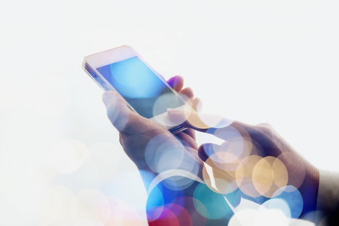 Graphic illustration of two hands using a mobile phone representing virtual simulation