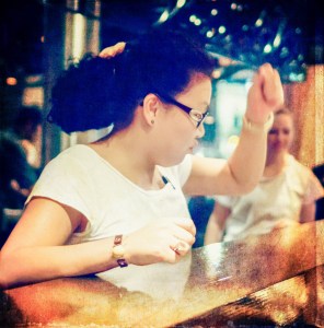 Asian woman working in restaurant representing Duality Hack 5: The worry-free life of the basic self