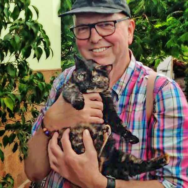 Alexius Jorgensen with his cat Guinevere representing Duality Hack 12: The key to Oneness is AloneTogether