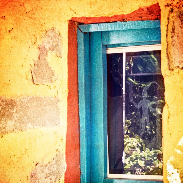 Colourful painterly image of a window frame revealing abstract shapes and light